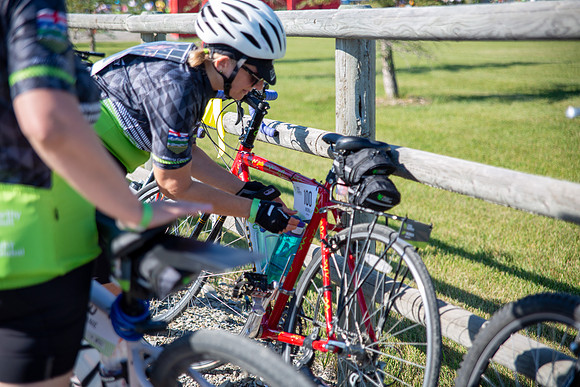 2-BIKE - RIDERS FIXING BIKES-3