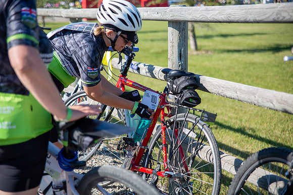 2-BIKE - RIDERS FIXING BIKES-2